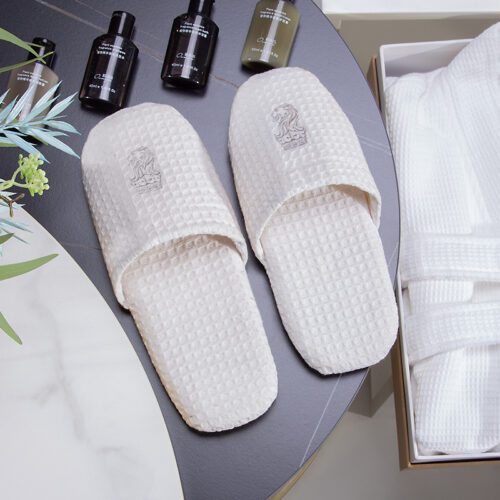 Embroidered Hotel Slippers, Designer Amenities and Patterned Towels